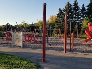 Red coloured playground structure in Yongehurst, Richmond Hill, Ontario